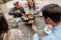 Preview: Moderner Tischgrill CIRCLE 35 beim BBQ mit Freunden