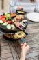 Preview: hoefats CIRCLE 35 Pfännchen-Set beim Überbacken von Speisen im Grill