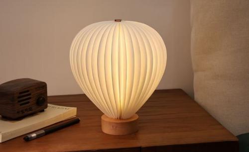 Preview: ingko Aeris Light Buche als stimmungsvolle Dekoration auf dem Nachttisch