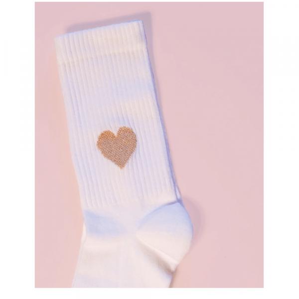 Paar weiße ooley Herzsocken mit gerippter Struktur und goldenem Glitzermotiv